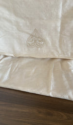 Hand embroidery on ivory eri silk
