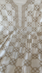 Chikankari worked by hand on eri silk