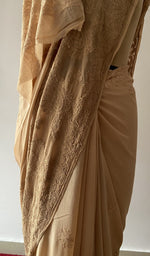 Fine chikankari on border and pallu across the pallu