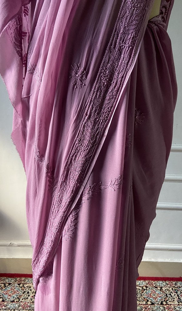 rose pink viscose georgette saree seen from the back