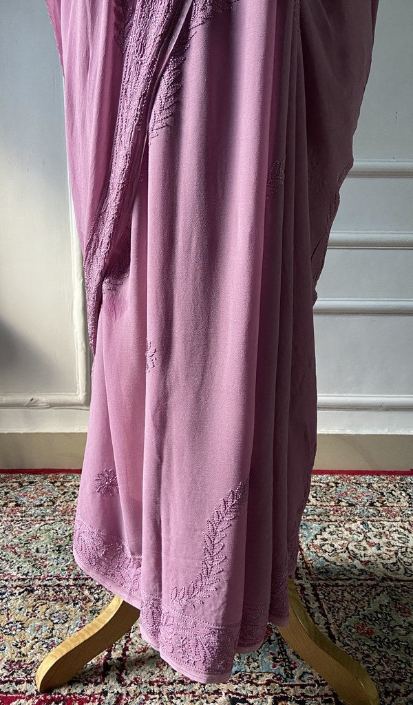 border detail on the rose pink viscose georgette saree