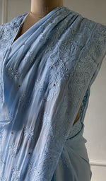 Load image into Gallery viewer, close view of the resham fine chikankari on powder blue viscose georgette