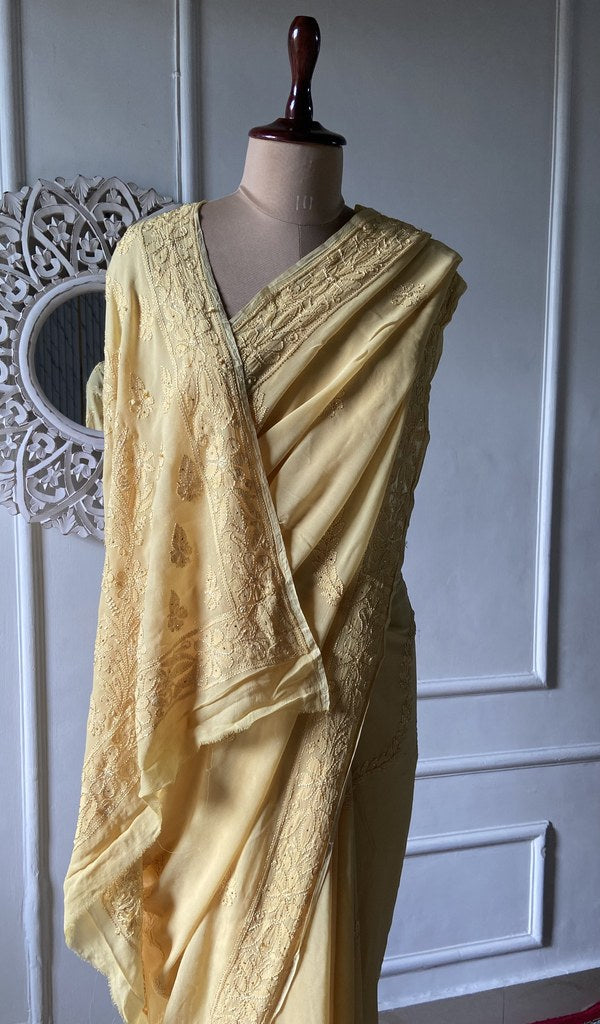 yellow viscose georgette saree, drape and pleats