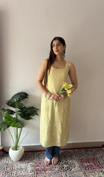 Yellow 2 pc stitched kurta set on the model, full length, front