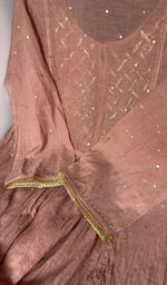 Hem and border of the brown dupatta