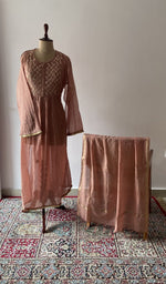 Brown pure mul chanderi chikankari suit set on the mannequin with its dupatta