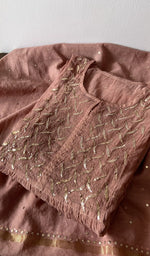Folded kurta piece and dupatta, chikankari along the hem