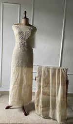 The set on the mannequin with its dupatta beside it