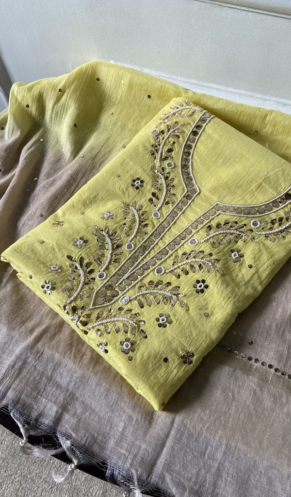 yellow pure mul chanderi chikankari suit set, folded