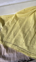 border and hem of the yellow kurta piece