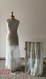 The set on the mannequin with its dupatta beside it