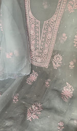 Motifs across the body of the blue kurta