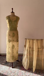 The set on the mannequin with its dupatta beside it