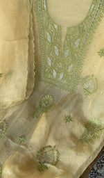 Motifs across the body of the yellow kurta