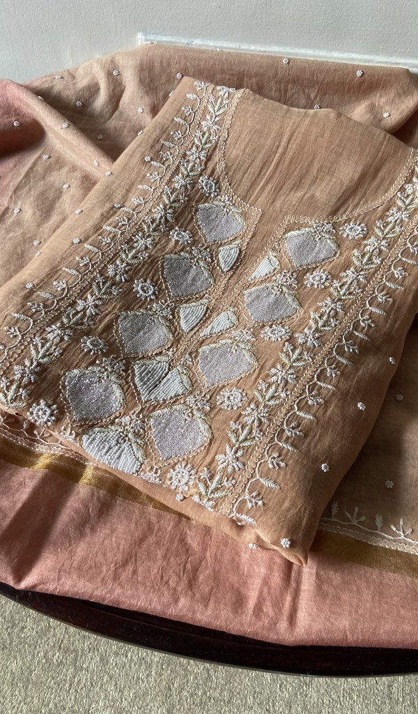 beige pure mul chanderi chikankari suit set, folded