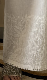 Hem embroidery on the white palazzo, up close