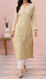 Beige kurti from the front, styled with a white pant