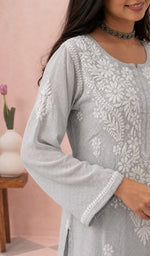 Grey kurti, sleeve and chikankari up close