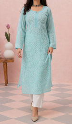 Aqua kurti from the front, styled with a white pant