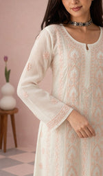 White kurti, sleeve and chikankari up close