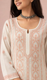 White kurti, neckline and yoke embroidery up close
