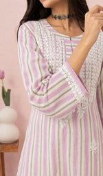 Pink kurti, sleeve and chikankari up close