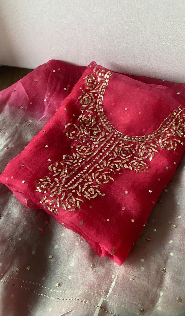 Red pure organza silk kurta piece folded, badla work on gala and boota