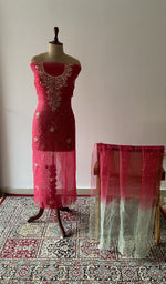 The set on the mannequin with its dupatta beside it