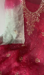 Motifs across the body of the red kurta