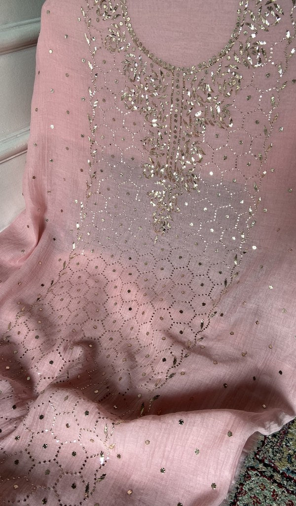 Close view of the chikankari on the rose pink kurta