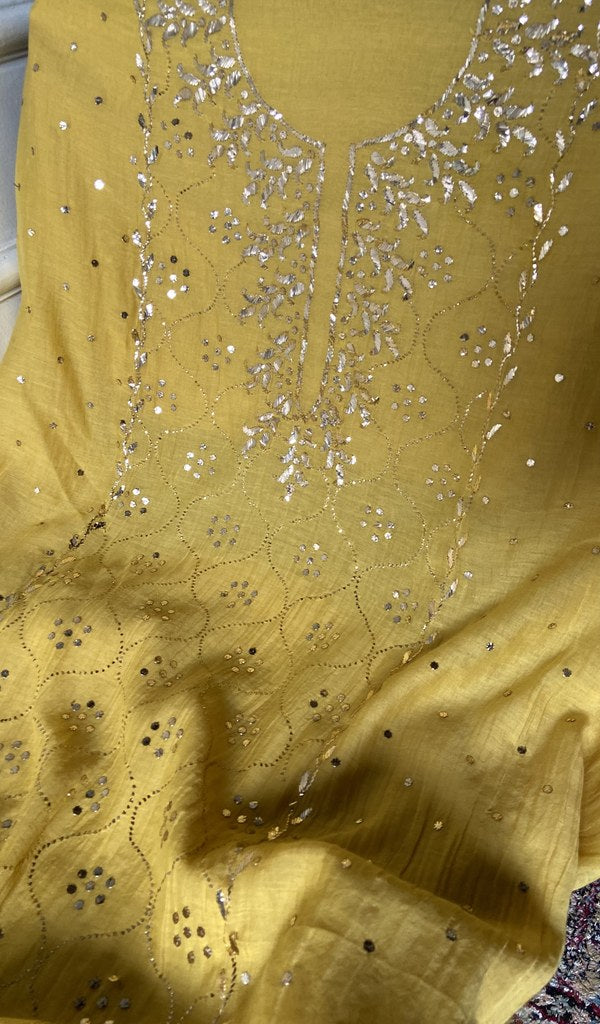 Close view of the chikankari on the yellow kurta