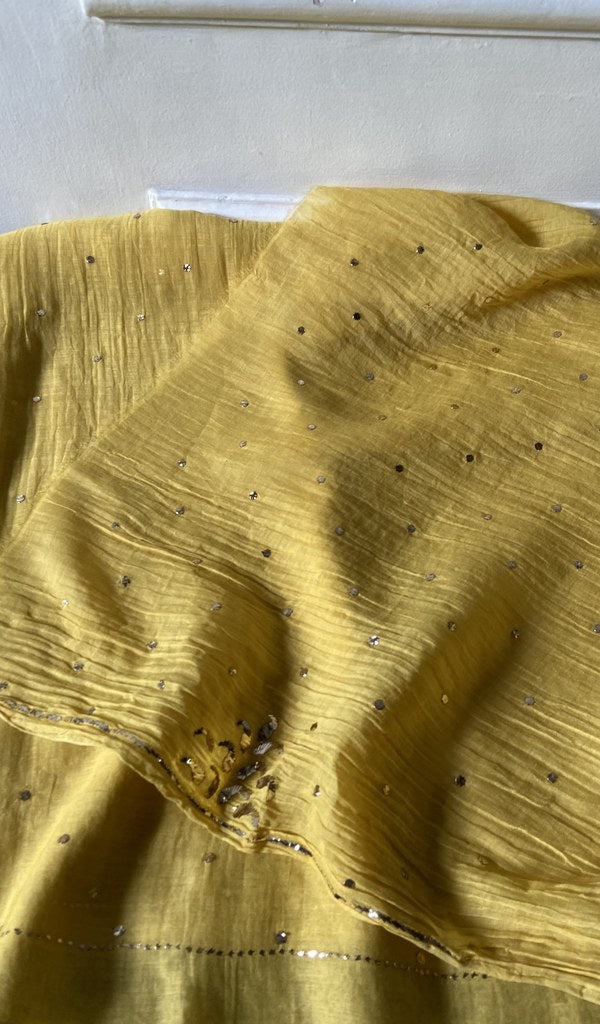 Detail of the embroidery on the yellow pure mul chanderi