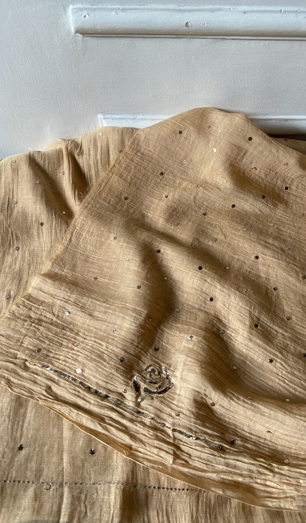 Detail of the embroidery on the beige pure mul chanderi