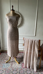 Mauve pure mul chanderi chikankari suit set on the mannequin, dupatta alongside