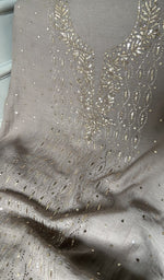Close view of the chikankari on the mauve kurta
