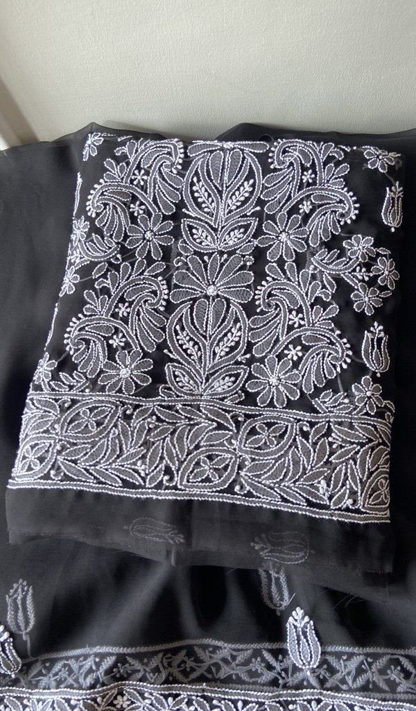 Folded black faux georgette kurta, front view