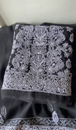 Folded black faux georgette kurta, front view