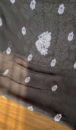Close view of the black kurta fabric