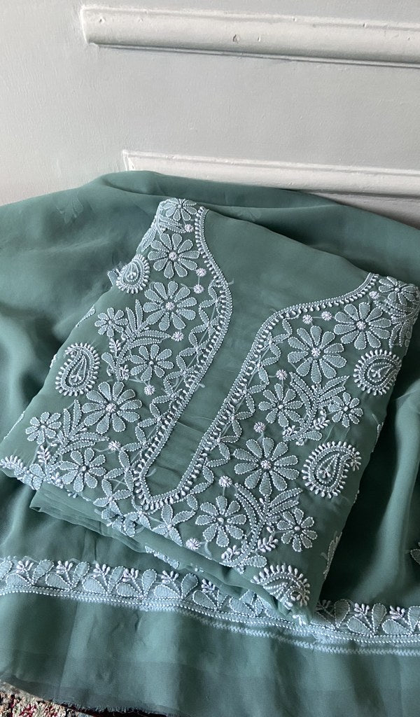 sea green chikankari set folded, worked panel on top