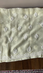 The cream kurta, spread out flat