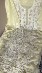 Cream faux georgette laid out flat