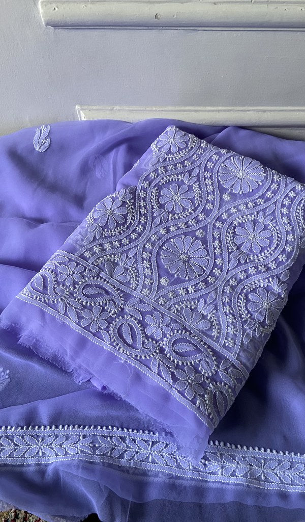 lavender chikankari set folded, worked panel on top