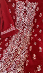 Red faux georgette laid flat on the table