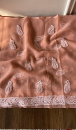 Hand embroidery on peach faux georgette