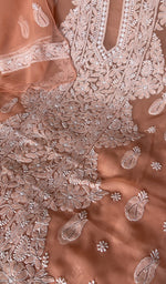 Stitch detail on the peach faux georgette kurta