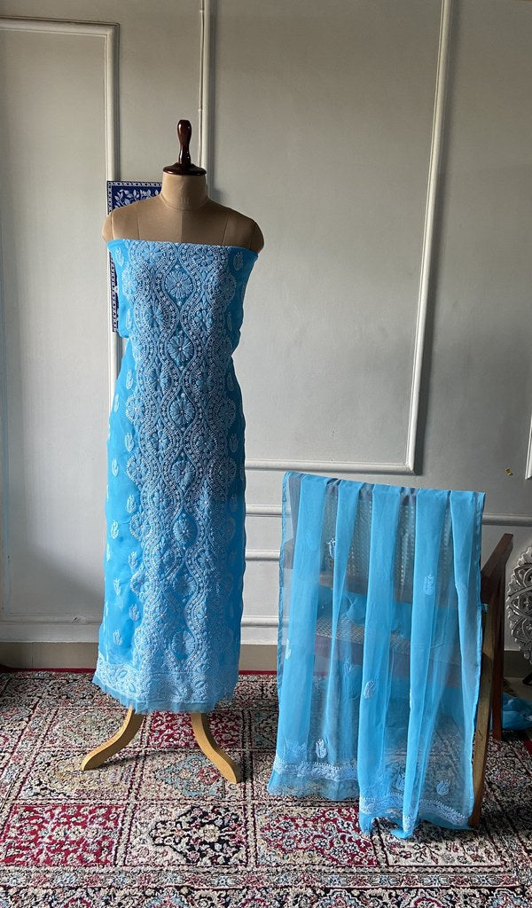 turquoise faux georgette chikankari 3 pc unstitched suit set on mannequin