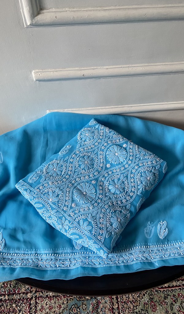 turquoise faux georgette chikankari 3 pc unstitched suit set, folded