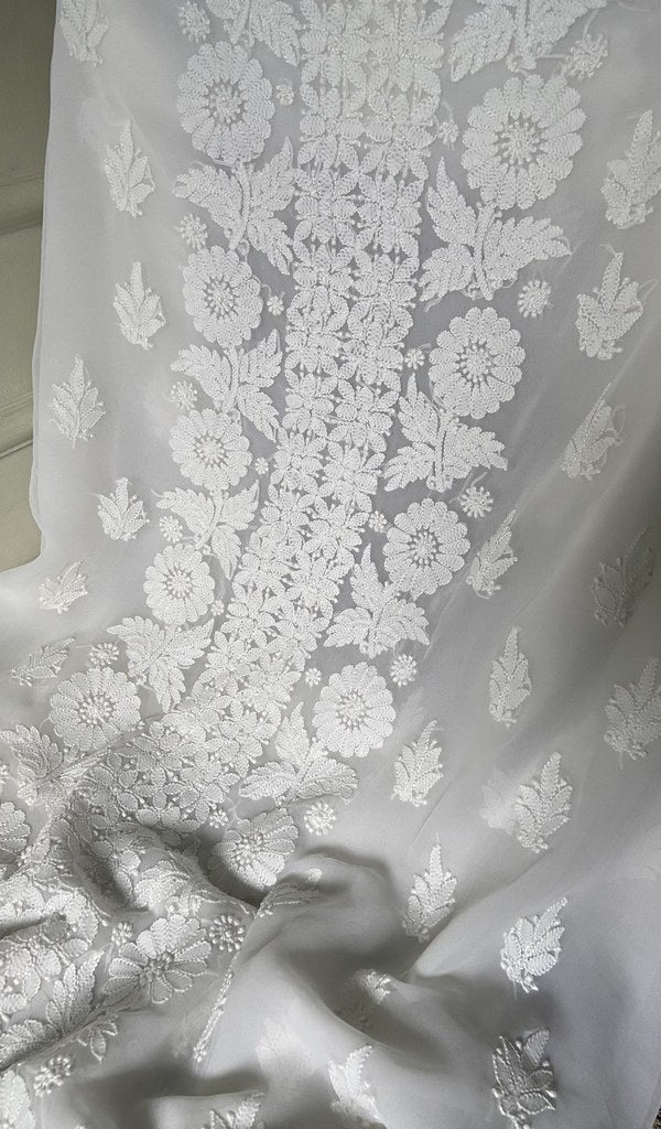 close view of the hand embroidery, white faux georgette