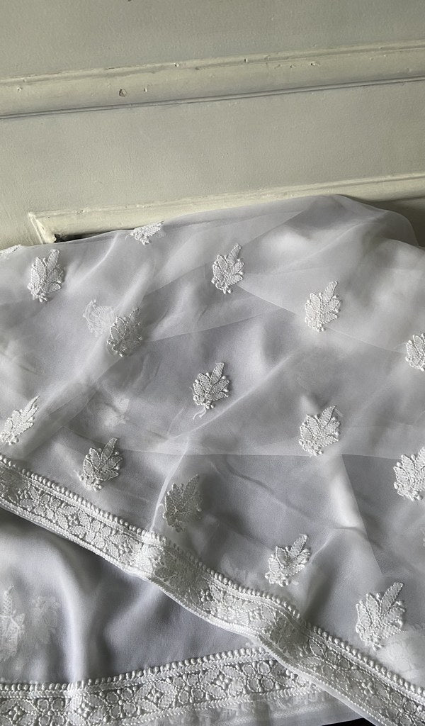 border and hem work on white faux georgette