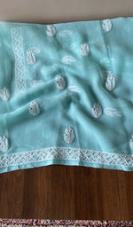 The aqua kurta, spread out flat